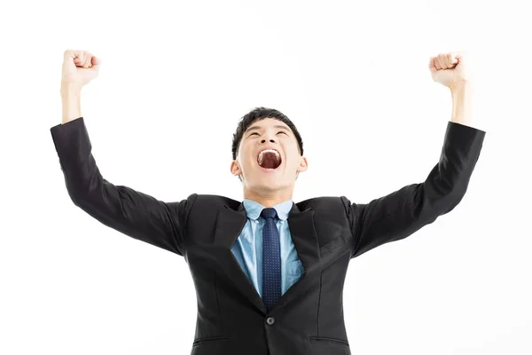 Opgewonden zakenman viering succes met hand omhoog — Stockfoto