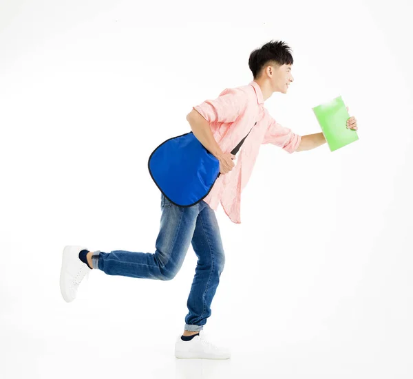 Junge männliche Studentin in Eile beim Laufen — Stockfoto