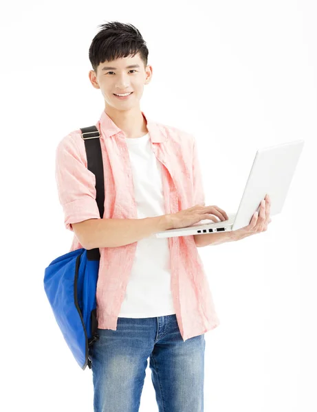 Estudante feliz segurando laptop isolado no branco — Fotografia de Stock