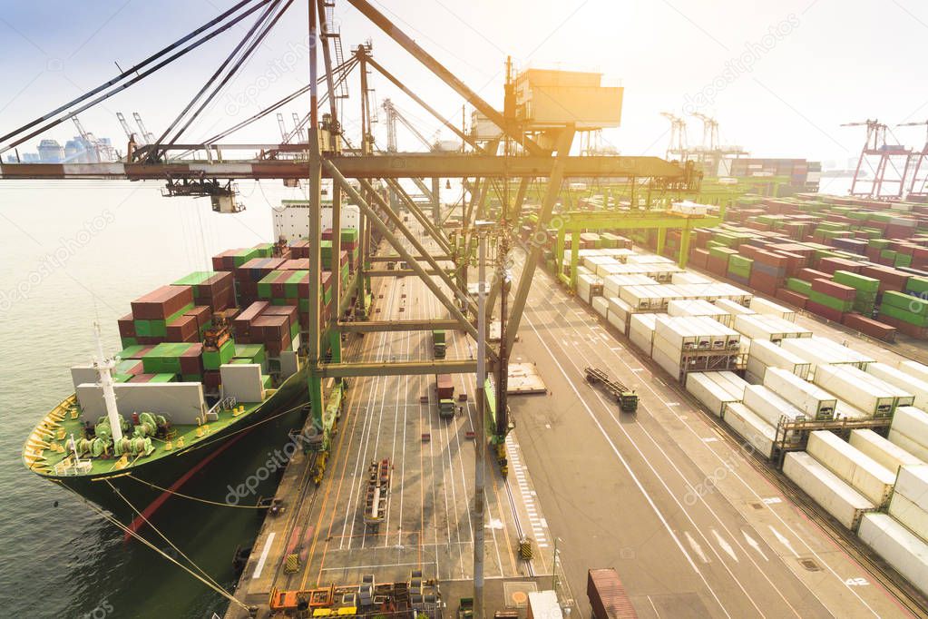 Aerial view of cargo dock and Container Ship