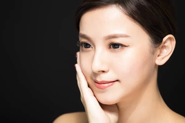 Closeup Beauty woman face isolated on black background — Stok Foto