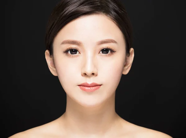 Closeup Beauty woman face isolated on black background — Stock Photo, Image