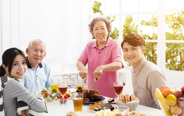 Happy family having dinner together