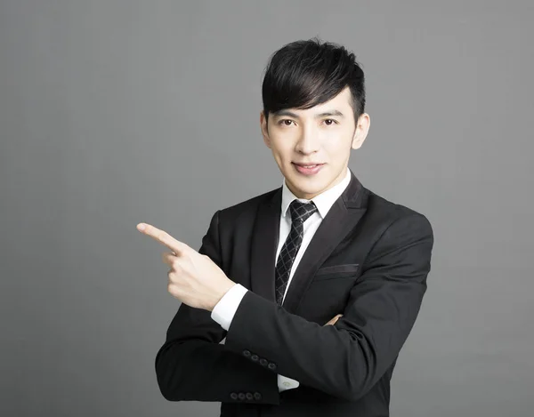 Young Businessman Pointing Copy Space — Stock Photo, Image