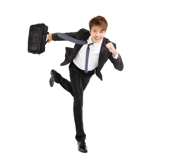 Šťastný mladý obchodní muž běží — Stock fotografie