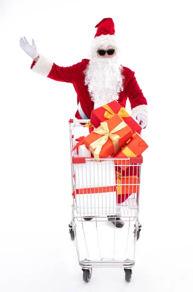 Happy Santa Claus with Christmas shopping cart — ストック写真