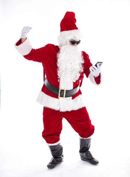 Šťastný Santa Claus sleduje chytrý telefon — Stock fotografie