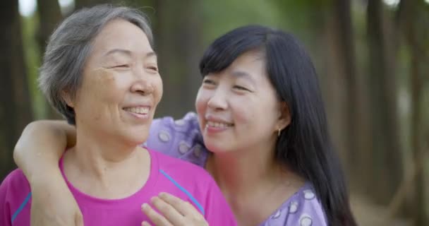 Cheerful Mature Woman Embracing Senior Mother — Stock Video