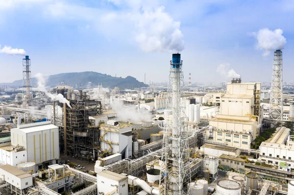 Aerial view of industrial area with chemical plant. Smoking chim — Stock Photo, Image