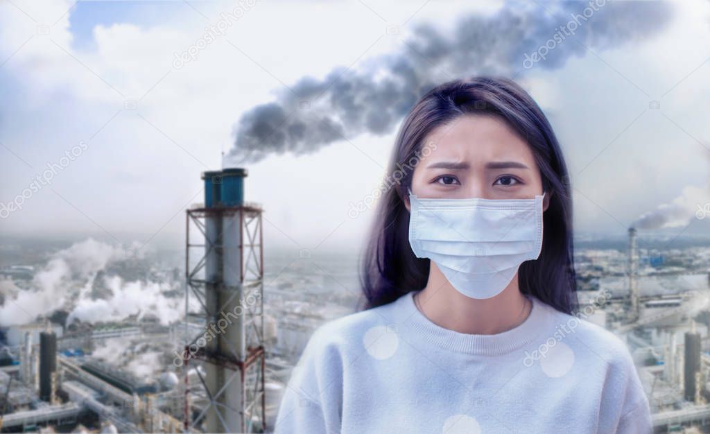 young  woman wear mask  with air pollution background