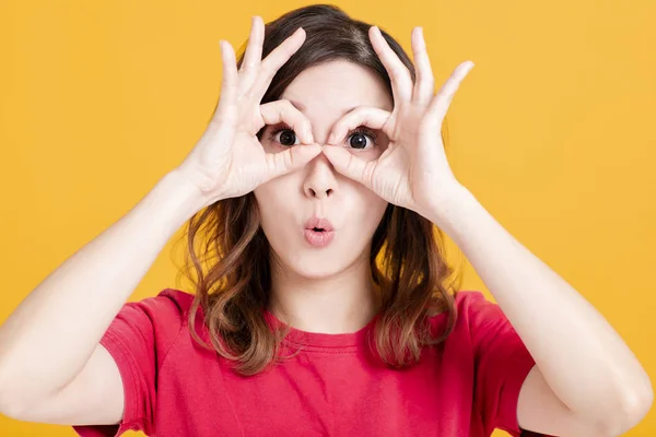 Surprised young asian woman with looking gesture — Stock Photo, Image