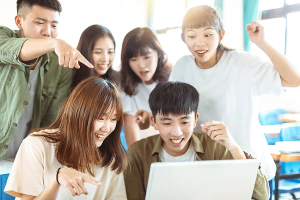 Excited College Students Looking Laptop Classroom — 스톡 사진