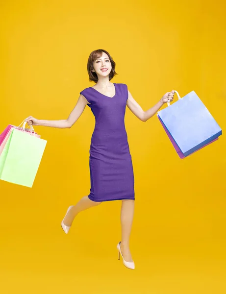 Happy Pretty Girl Holding Shopping Bags Running — Stock Photo, Image