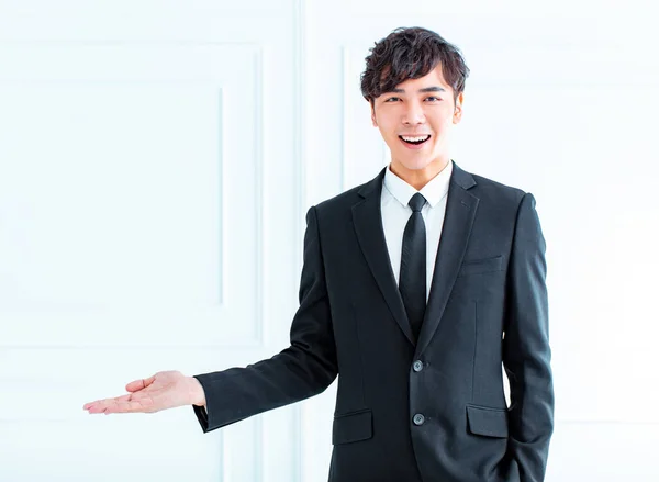 Smiling Young Businessman Hand Showing Something — Stock Photo, Image