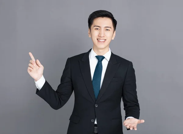 Young Businessman Presenting Something Hand — Stock Photo, Image
