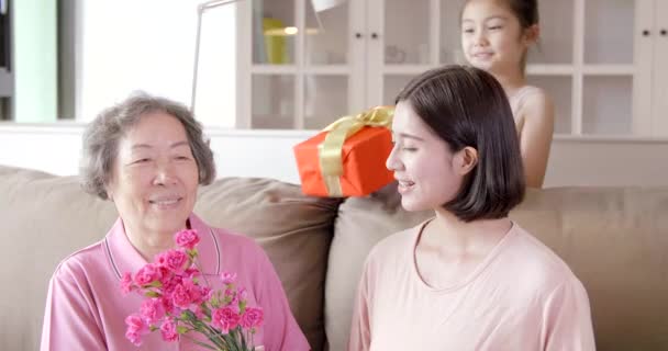 Happy Mother Day Child Mother Congratulating Grandmother Giving Her Flowers — Stock Video