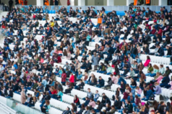 Niewyraźne tłum widzów na stadionie: — Zdjęcie stockowe