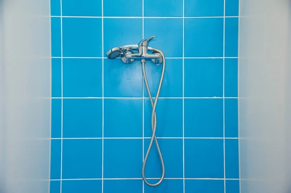 Empty and dry shower area of a fitness club