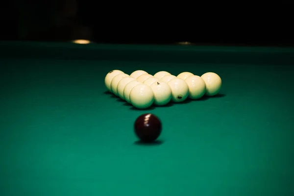 stock image Sports game of billiards on a green cloth. Billiards white billiard balls close up