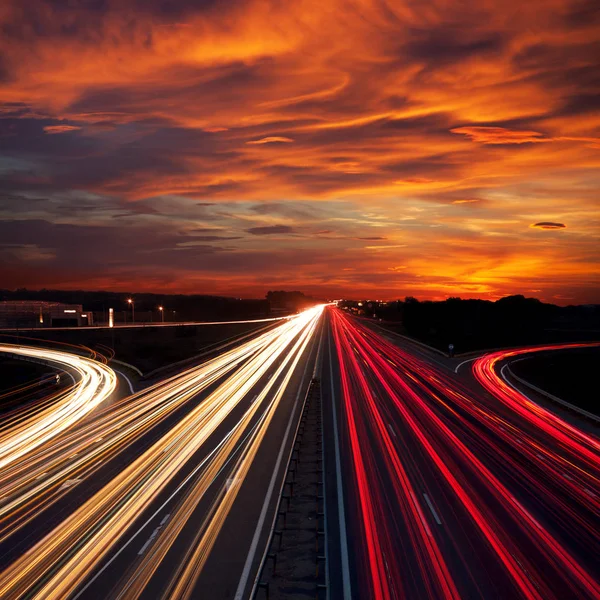 Speed Traffic at Sundown Time - light trails on motorway highway — Stock Photo, Image