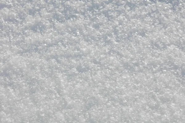 Ekte snøstrukturbakgrunn - snøfnugg-krystaller – stockfoto