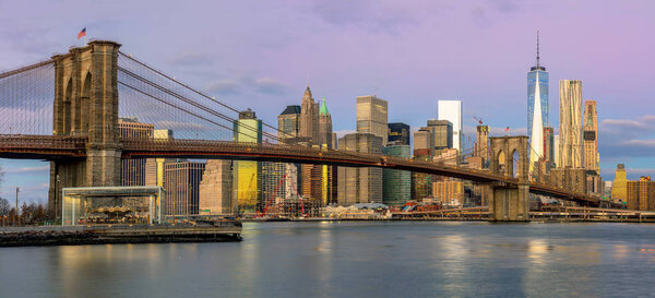 New York City - Panoramic view of Manhattan with famous Brooklin Bridge at early morning, big size