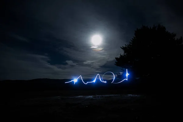 Noche lightpainting a la luz de la luna Fotos De Stock