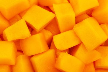 Dilimlenmiş mango parçacıkları dokusu yakın çekim