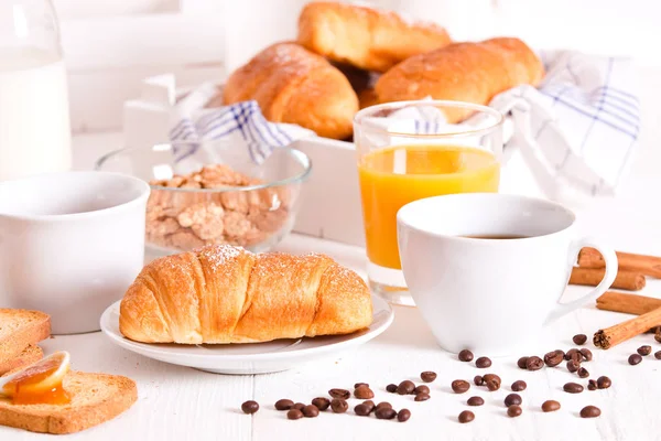 Breakfast with croissant on white dish. — Stock Photo, Image