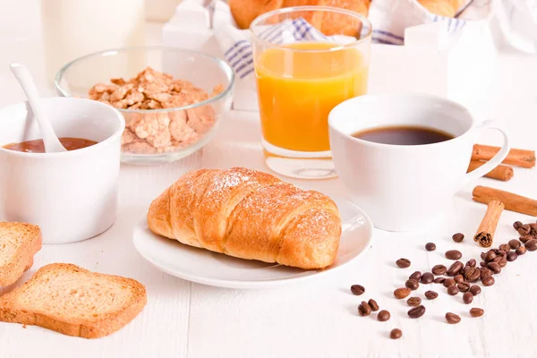 Breakfast with croissants on white dish. — Stock Photo, Image