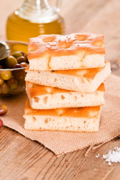 Focaccia bread on cutting board. — Stock Photo, Image