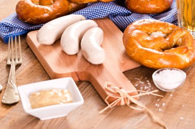 Bavarian pretzels on wooden table.  clipart