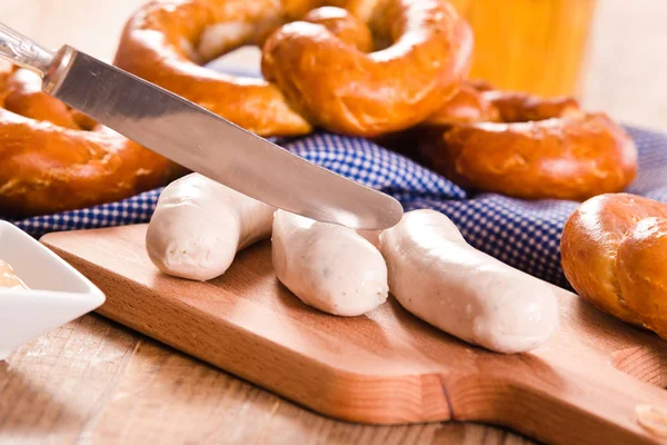 Bavarian pretzels on blue dish. — Stock Photo, Image