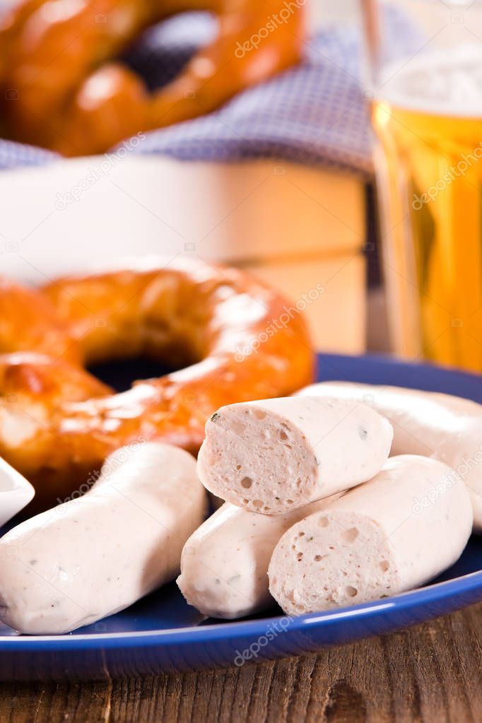 Bavarian pretzels on blue dish. 