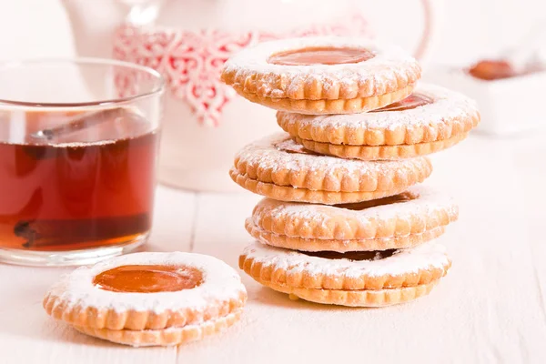 Teatime biscuits on wooden table. — Stock Photo, Image