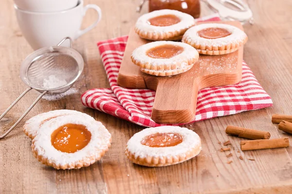Teatime biscuits with jam.