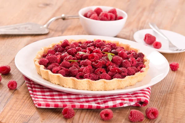 Raspberry tart on white dish. — Stock Photo, Image