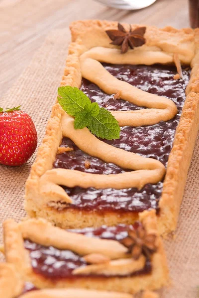 Strawberry tart on wooden table. — Stock Photo, Image
