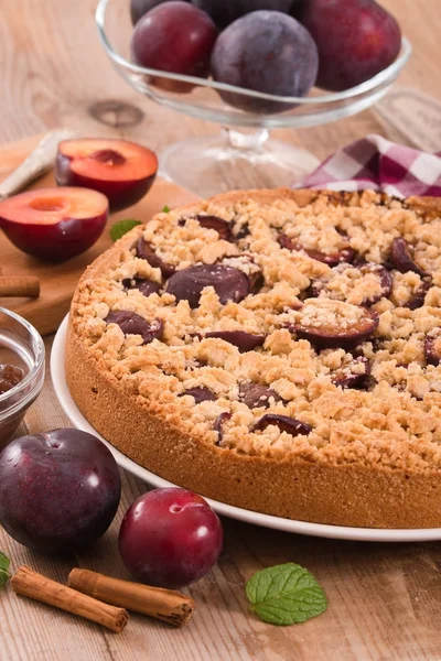 Plum tart on wooden table. — Stock Photo, Image