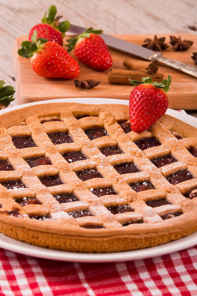 Strawberry Tart on white dish. 