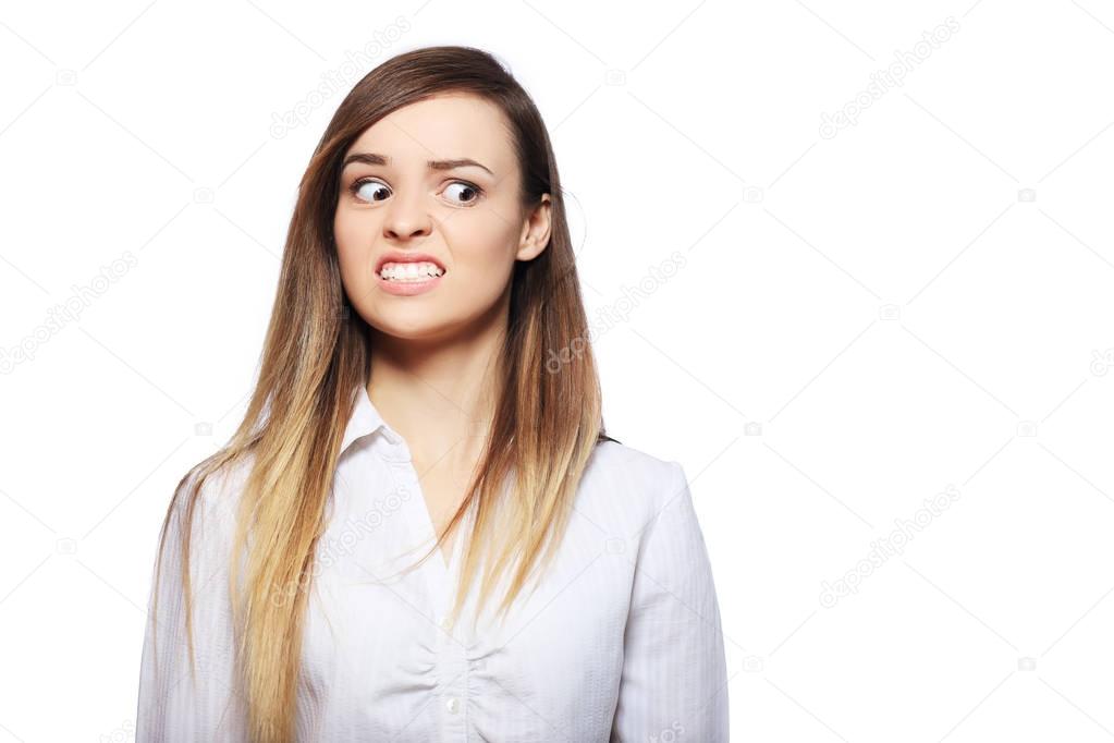 woman looking with frowny expression