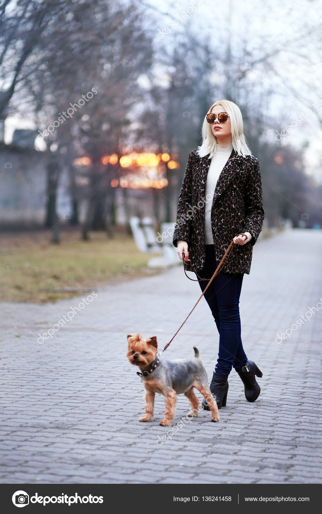 depositphotos_136241458-stock-photo-woman-walking-with-dog.jpg