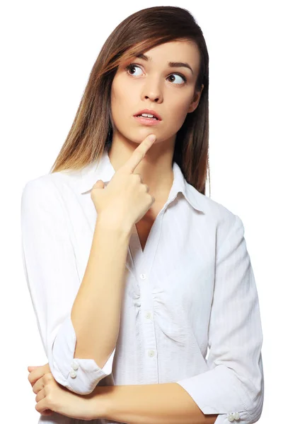 Young woman with finger on chin — Stock Photo, Image