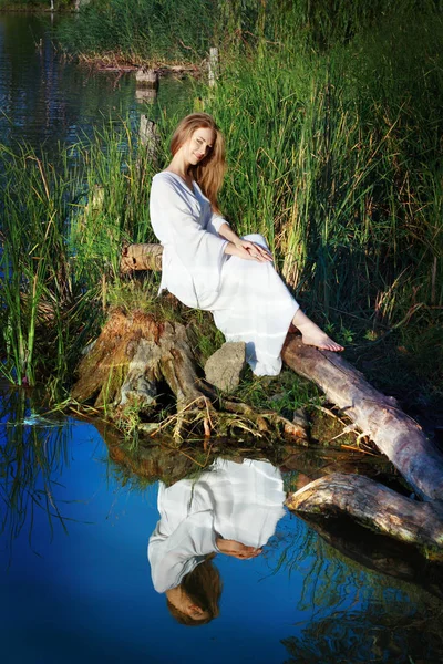 Fairy woman near forest lake — Stock Photo, Image