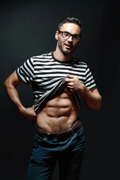 Man showing abdominal muscle — Stock Photo, Image