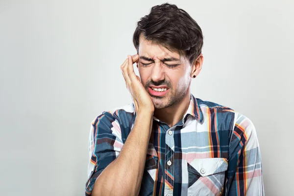 Young man having headache — Stock Photo, Image