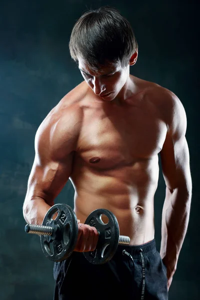 Man hold dumbbell — Stock Photo, Image