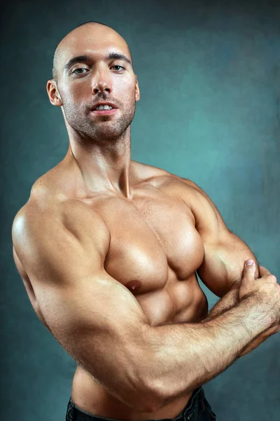 Strong muscular man with bared torso — Stock Photo, Image