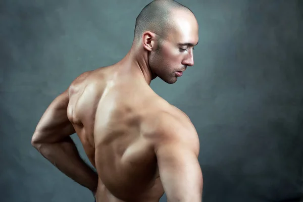 Strong muscular man — Stock Photo, Image