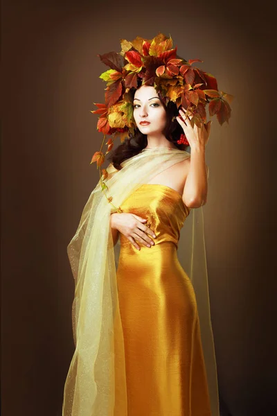 Woman Yellow Dress Floral Wreath Standing Brown Background — Stock Photo, Image